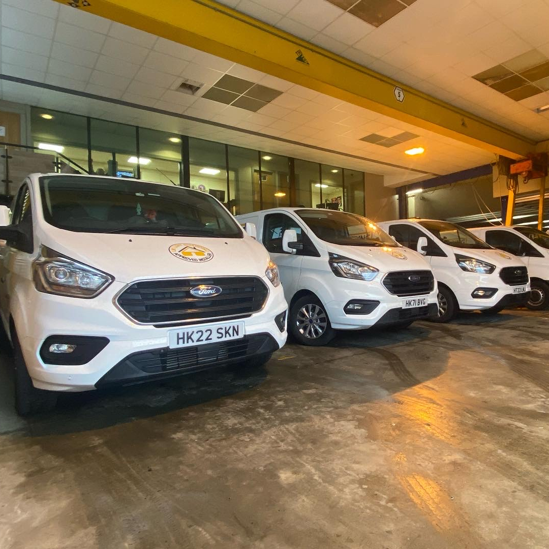 Loft Boarding Team liveried vehicles